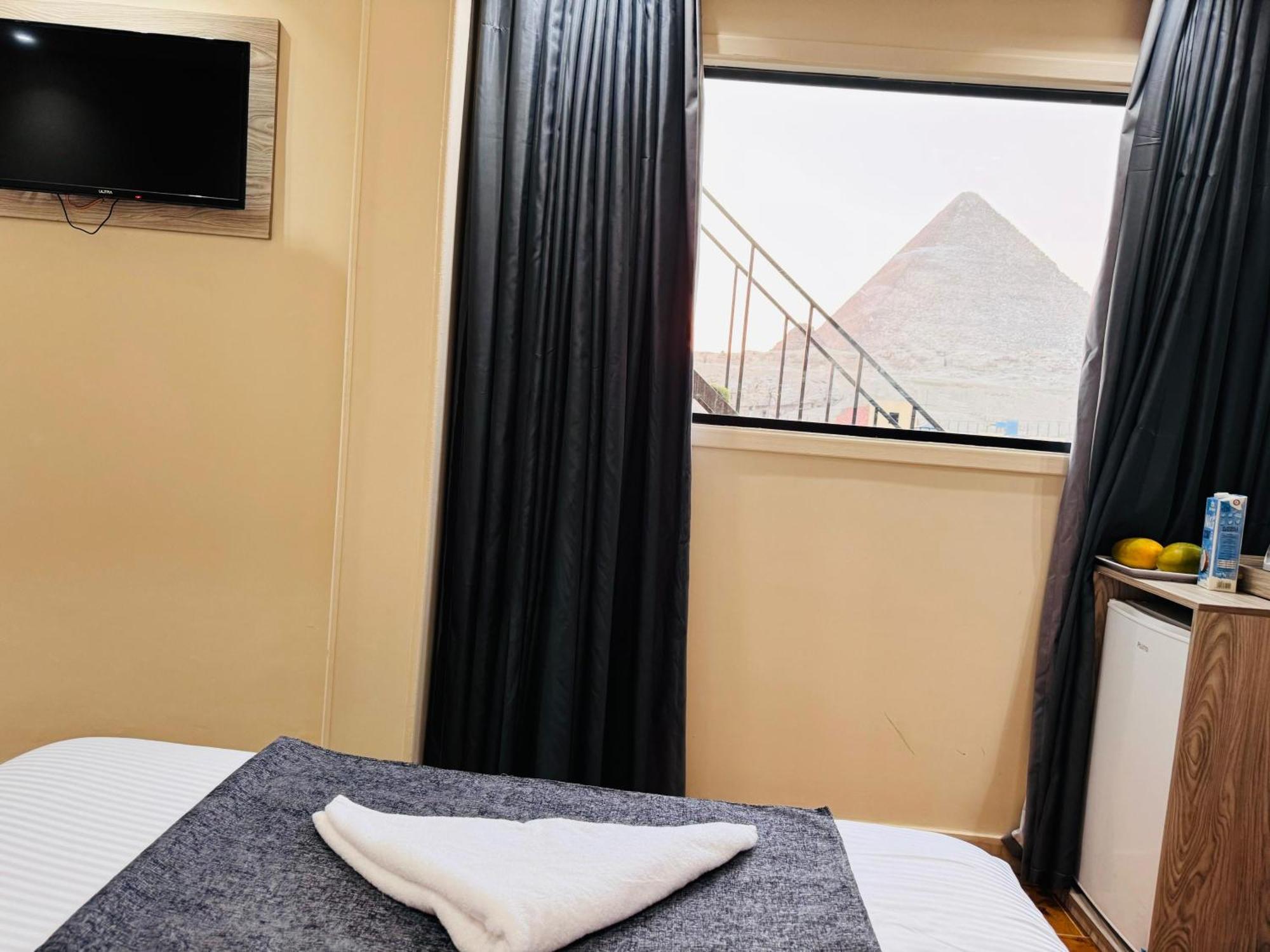 Hotel New Scarab Pyramids View Kafret el-Gabal Esterno foto